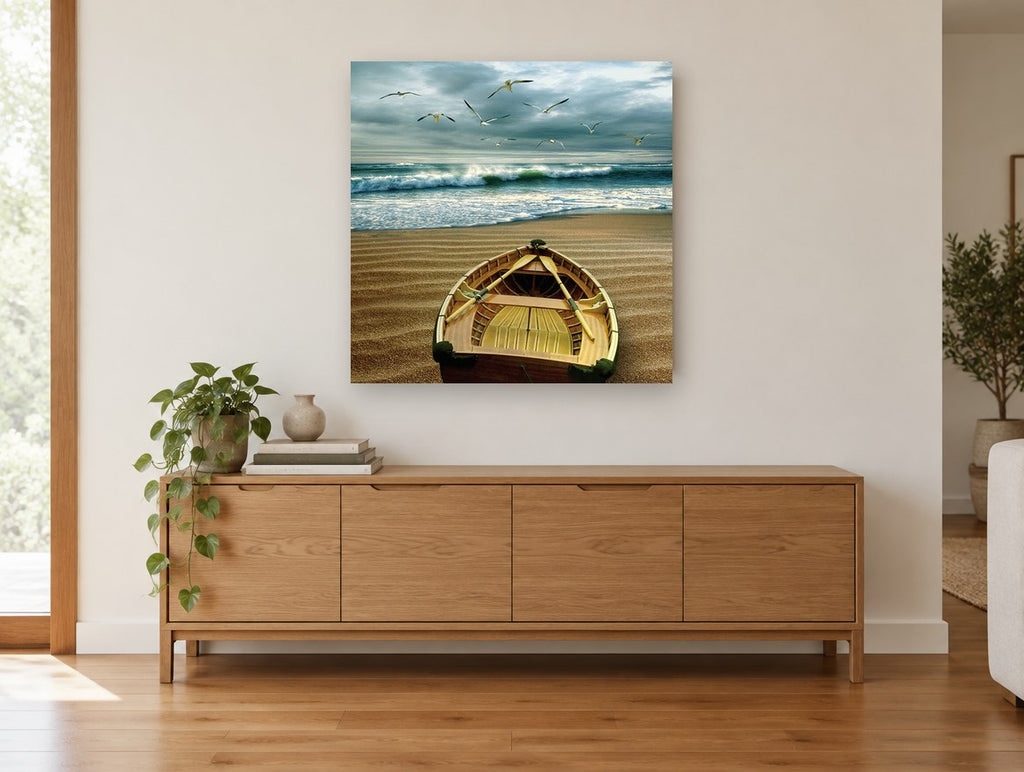 Dawn Rowboat and Gulls coastal canvas print on the wall of a living room above a sideboard