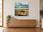 Dawn Rowboat and Gulls coastal canvas print on the wall of a living room above a sideboard