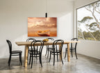 Amber Dusk Rowboat coastal canvas print on the wall of a dining room