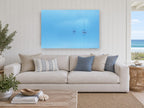Blue Haze Moorings coastal canvas print on the wall of a beach house living room