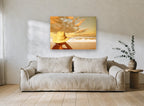 Golden Hat Beach Gaze coastal canvas print on the wall of a living room