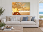 Golden Hat Beach Gaze coastal canvas print on the wall of a beach house living room
