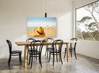 Hat and Seagulls coastal canvas print on the wall of a dining room