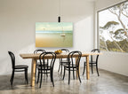 Stranded Boat at Dawn coastal canvas print on the wall of a dining room