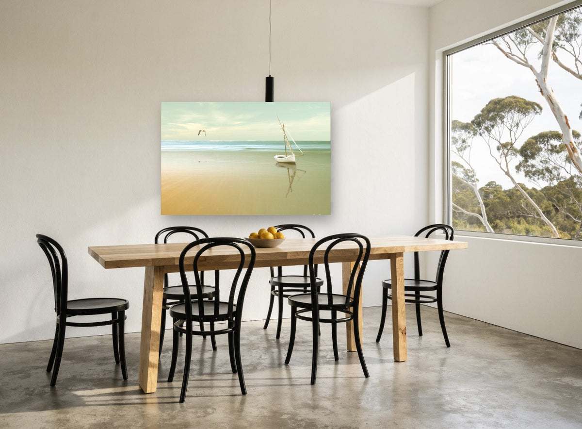 Stranded Boat at Dawn coastal canvas print on the wall of a dining room