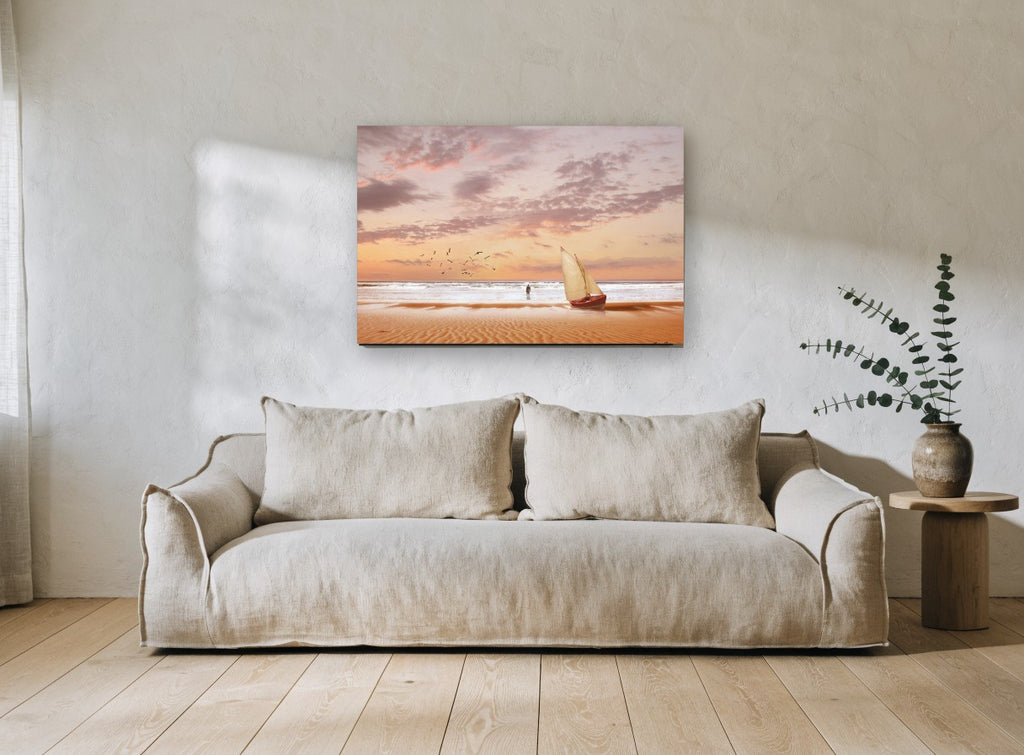 Dawn Sail on Rippled Sand coastal canvas print on the wall of a living room