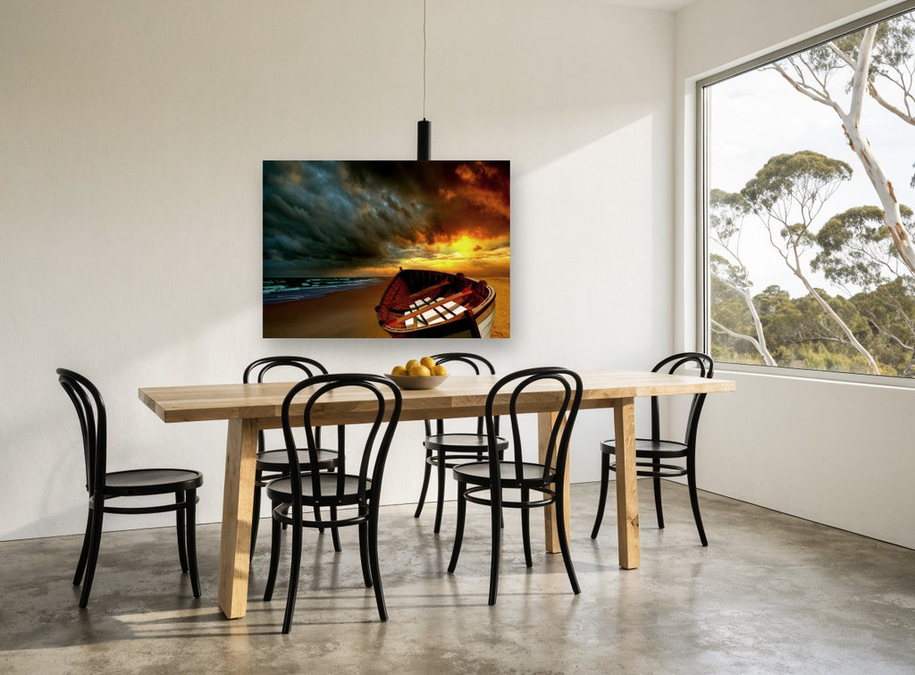 Stormlit Beach Dinghy coastal canvas print on the wall of a dining room