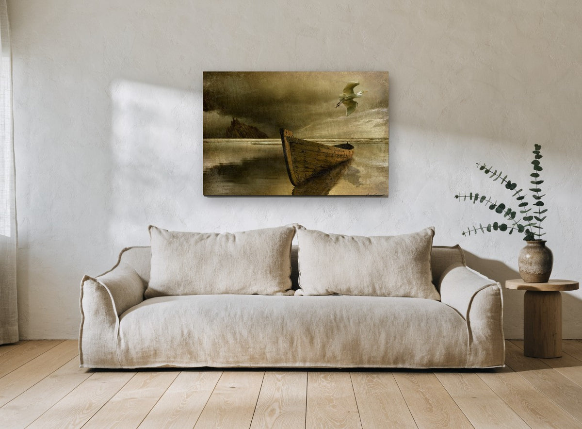Lone Boat and Egret coastal canvas print on the wall of a living room
