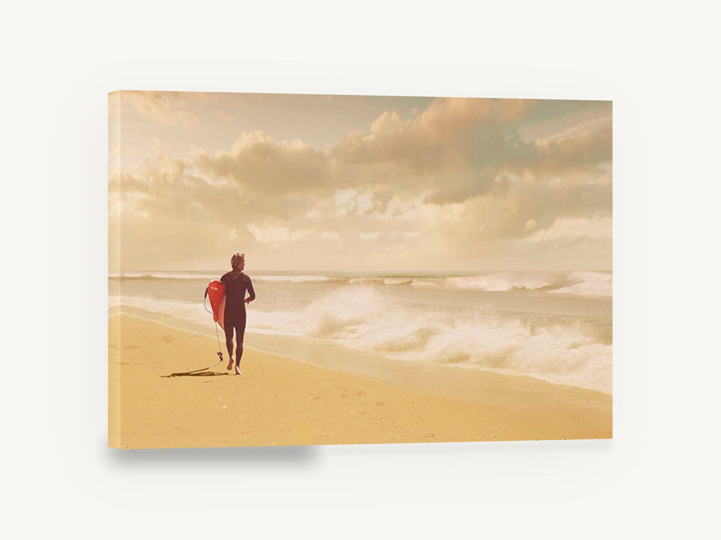 Surfer Walking the Shore, surfer walking beach warm toned photograph, coastal canvas wall art print ready to hang