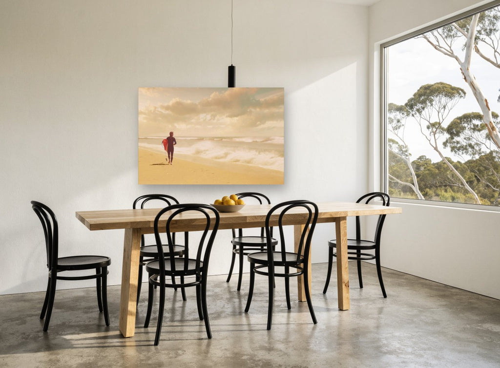 Surfer Walking the Shore coastal canvas print on the wall of a dining room