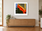 Orange Hull Reflection coastal canvas print on the wall of a living room above a sideboard