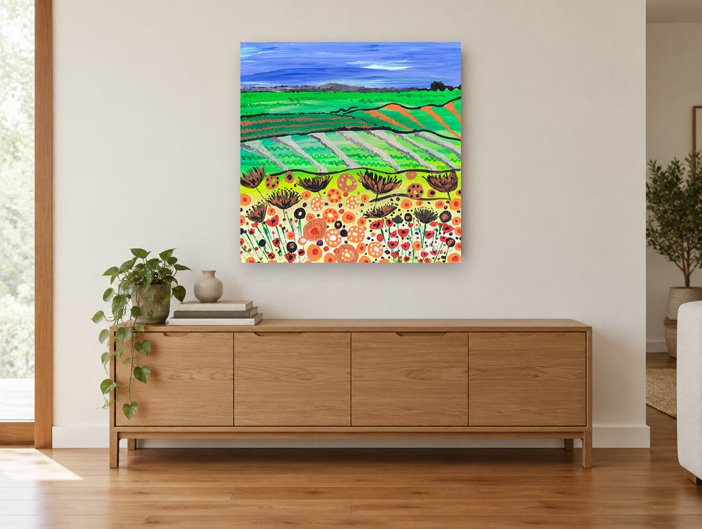 Poppy Field Patchwork landscape canvas print on the wall of a living room above a sideboard