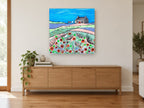 Washing Day Poppies landscape canvas print on the wall of a living room above a sideboard