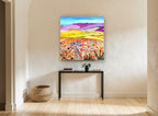 Lilac Hills Poppy Meadow landscape canvas print on the wall of a hallway