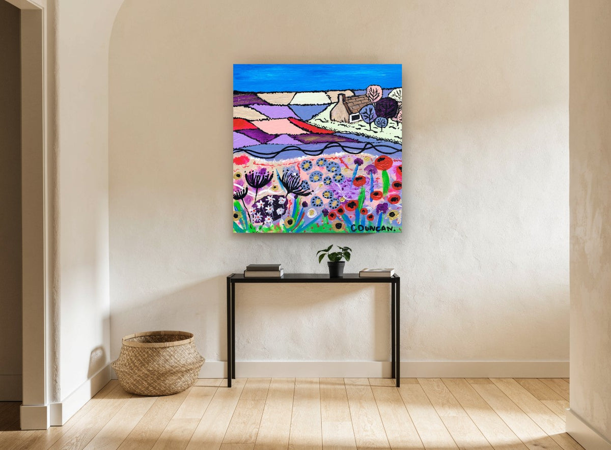 Cottage Above Poppy Meadow landscape canvas print on the wall of a hallway