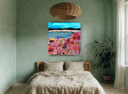 Poppy Shore Meadow coastal canvas print on the wall of a bedroom
