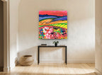 Crimson Sky Meadow landscape canvas print on the wall of a hallway