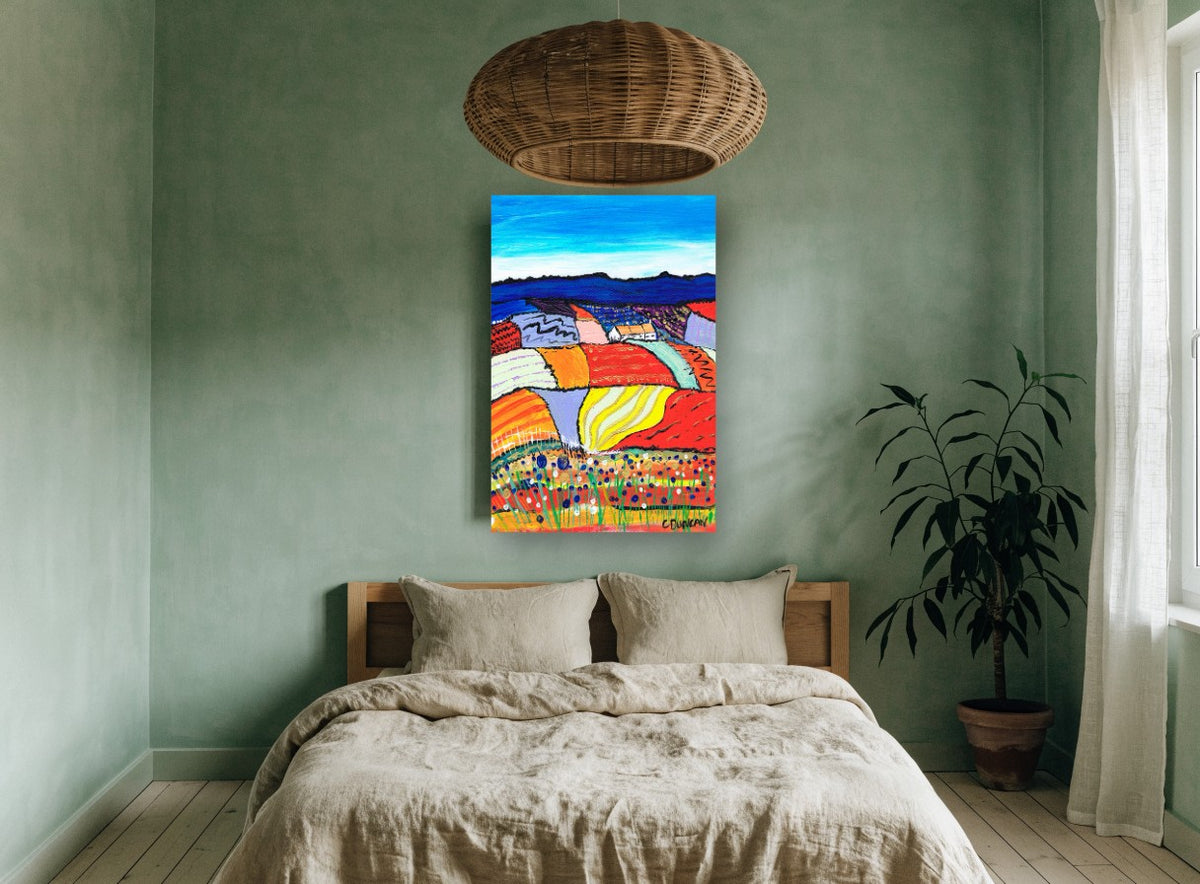 Patchwork Hills Bloom landscape canvas print on the wall of a bedroom