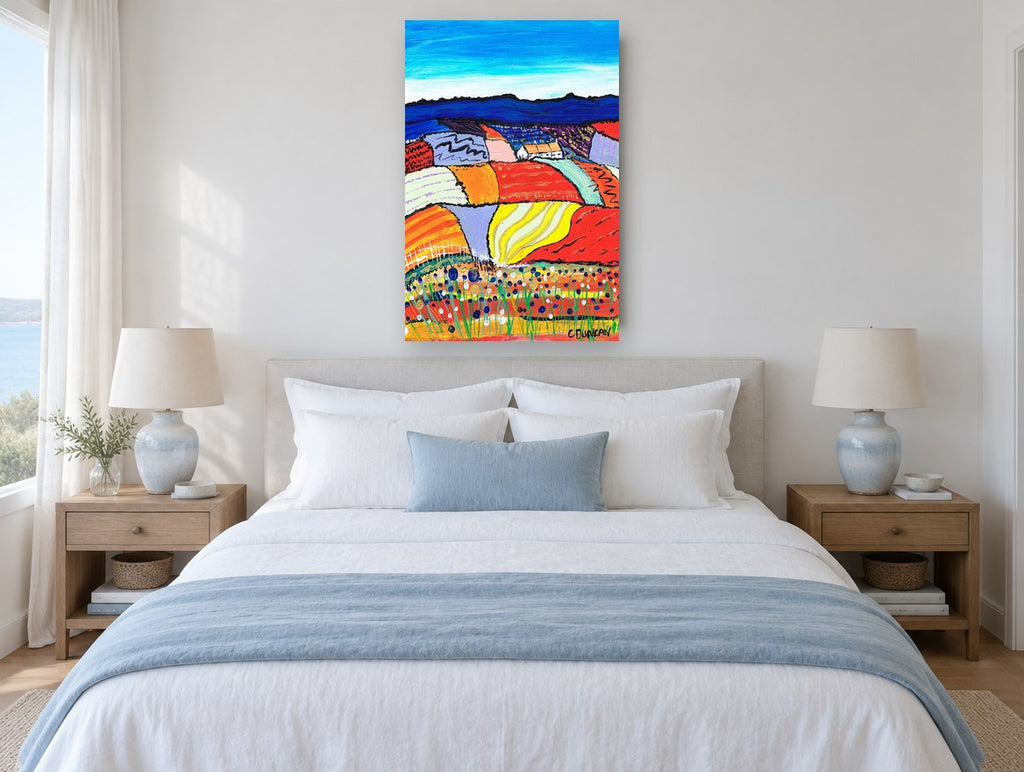 Patchwork Hills Bloom landscape canvas print on the wall of a bedroom