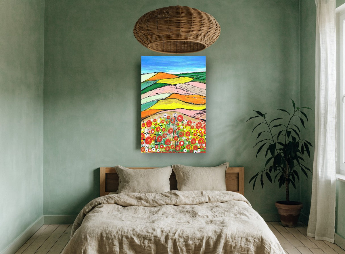 Poppy Patchwork Hills landscape canvas print on the wall of a bedroom