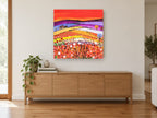 Poppy Hill Farmhouse landscape canvas print on the wall of a living room above a sideboard