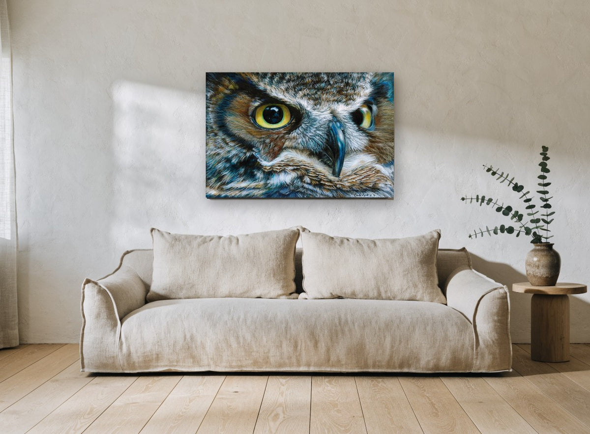 Watchful Horned Owl animal canvas print on the wall of a living room