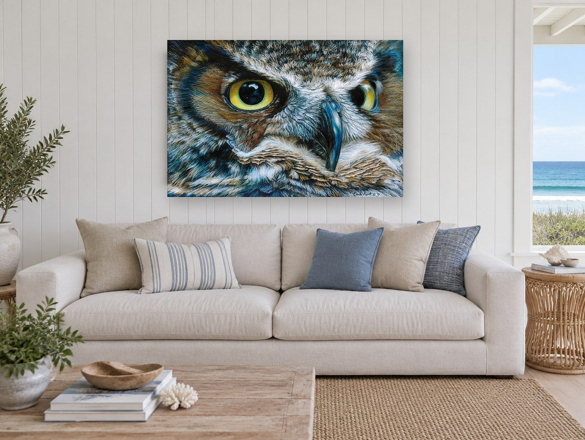 Watchful Horned Owl animal canvas print on the wall of a beach house living room