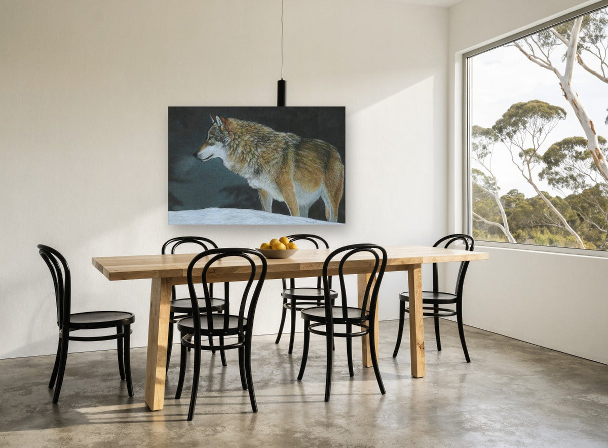 Wolf on Winter Snow landscape canvas print on the wall of a dining room