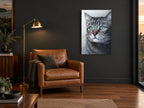 Pale Blue Gaze Tabby animal canvas print on the wall of a charcoal living room