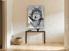 Watchful Winter Wolf landscape canvas print on the wall of a hallway