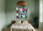 Garden of Soft Blooms floral canvas print on the wall of a bedroom