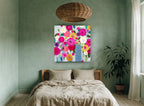 Bright Blooms in Blue Vase floral canvas print on the wall of a bedroom