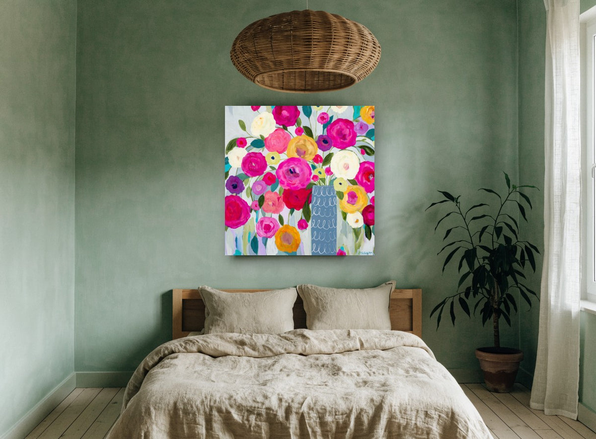 Bright Blooms in Blue Vase floral canvas print on the wall of a bedroom