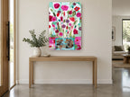Pink Posies in Teal Vase floral canvas print on the wall of a entry hall