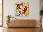 Cheerful Poppy Field floral canvas print on the wall of a living room above a sideboard