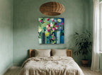 Vases of Bright Blooms floral canvas print on the wall of a bedroom