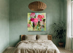 Pink Roses in Motion floral canvas print on the wall of a bedroom