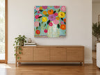Fiesta Bouquet on Teal floral canvas print on the wall of a living room above a sideboard