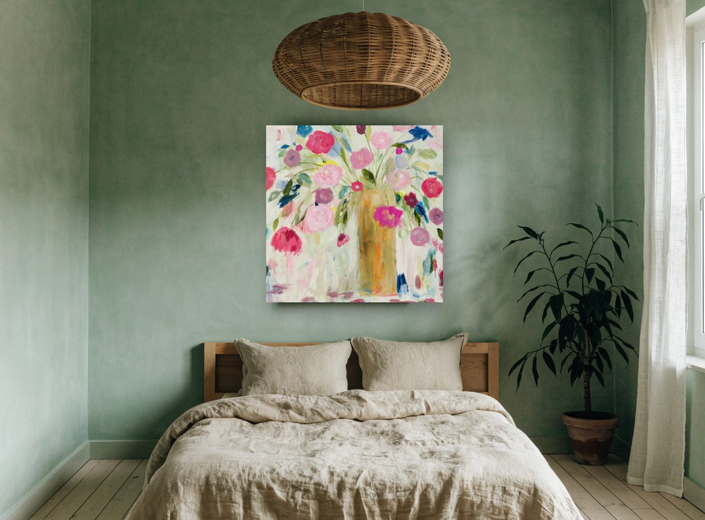 Loose Pink Bouquet floral canvas print on the wall of a bedroom