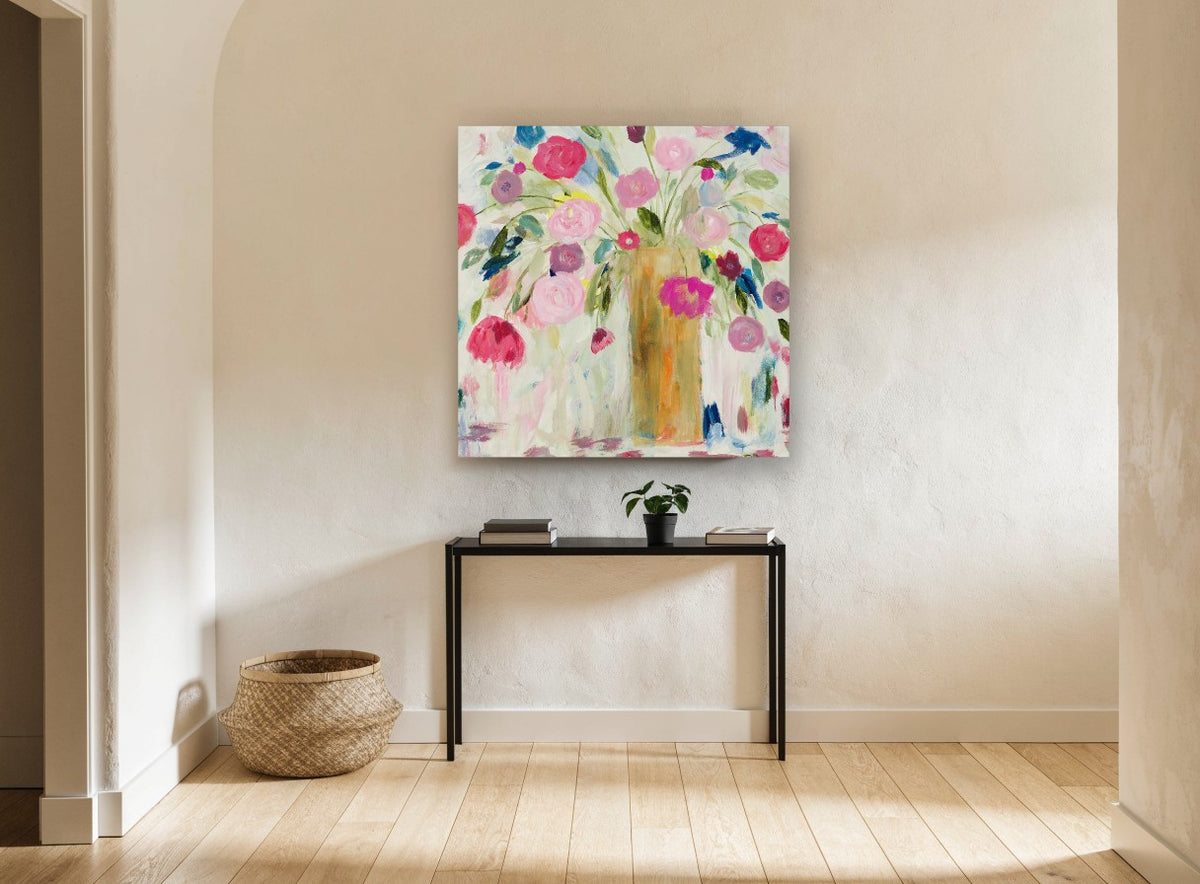 Loose Pink Bouquet floral canvas print on the wall of a hallway