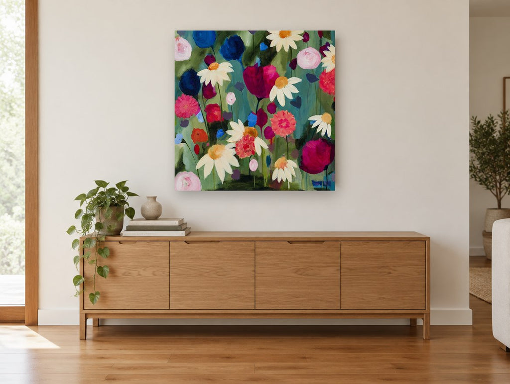 Daisy Garden Reverie floral canvas print on the wall of a living room above a sideboard