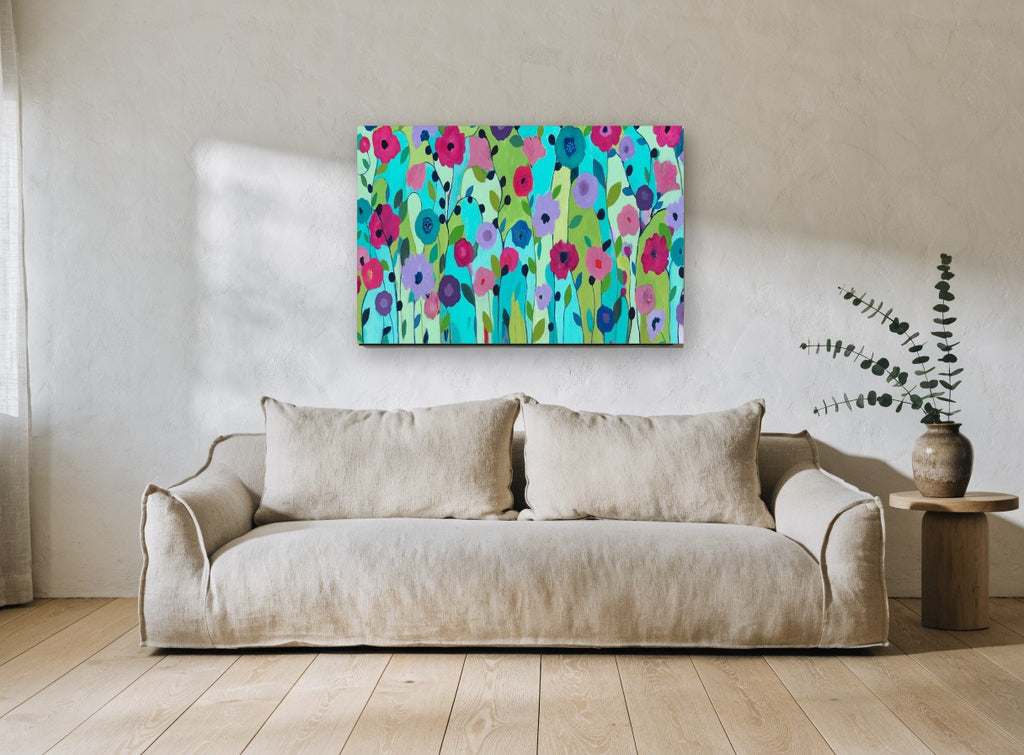 Garden of Bright Blooms floral canvas print on the wall of a living room