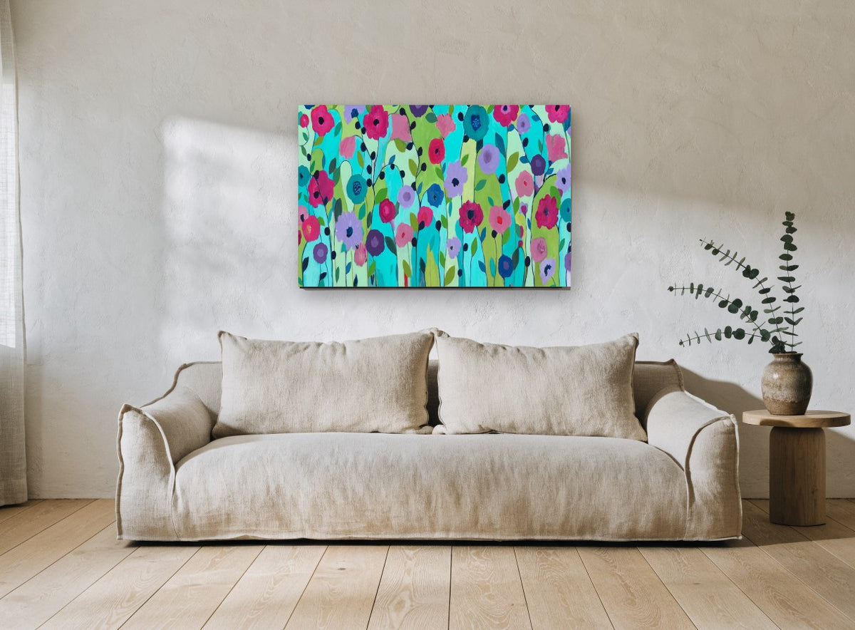 Garden of Bright Blooms floral canvas print on the wall of a living room