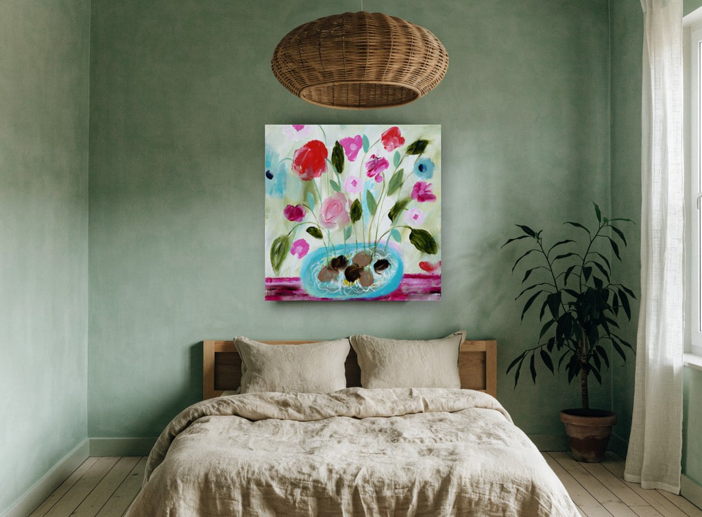 Pink Blooms in Turquoise Bowl floral canvas print on the wall of a bedroom