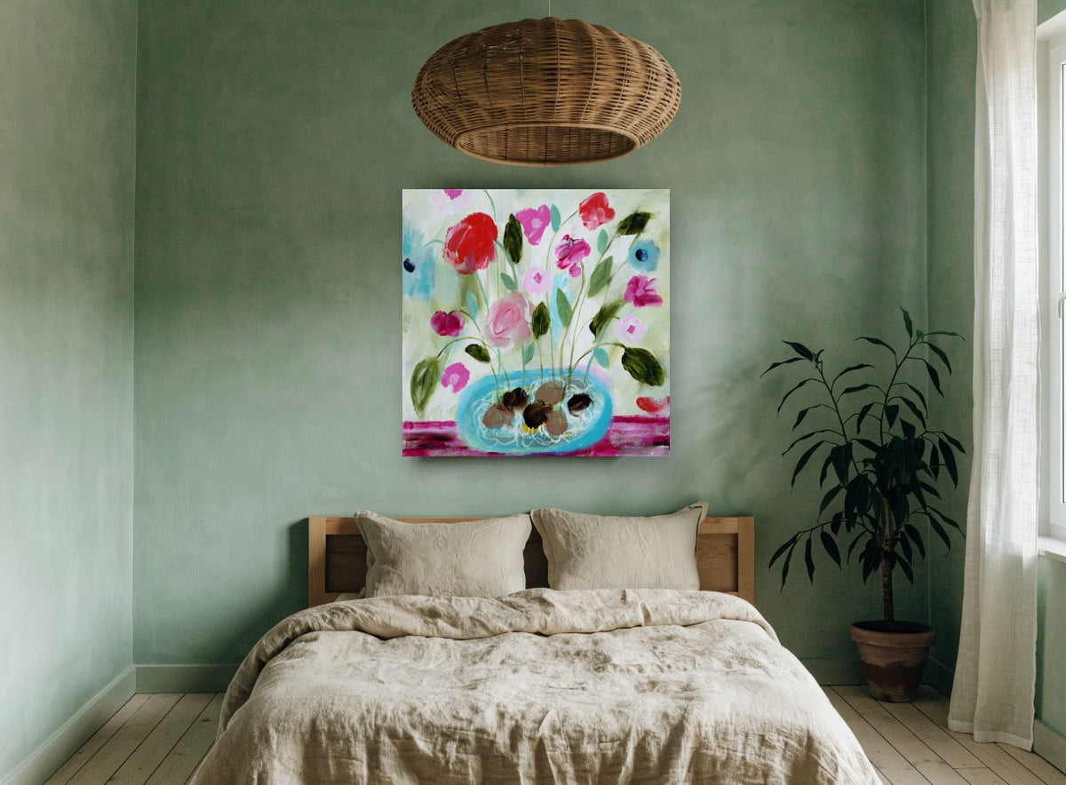 Pink Blooms in Turquoise Bowl floral canvas print on the wall of a bedroom