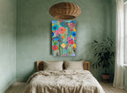 Meadow of Bright Blooms floral canvas print on the wall of a bedroom
