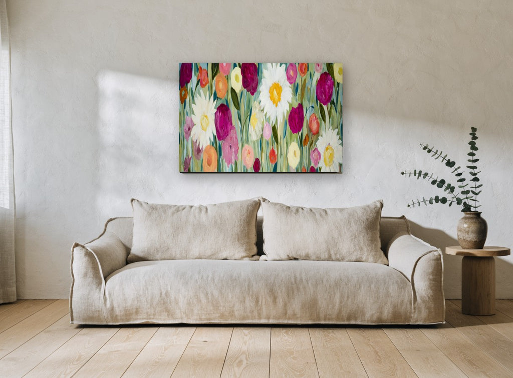 Meadow of Daisies floral canvas print on the wall of a living room