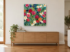 Wild Garden Bloom floral canvas print on the wall of a living room above a sideboard