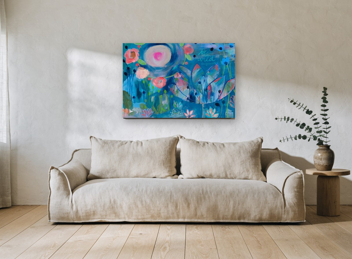 Wild Blue Garden floral canvas print on the wall of a living room