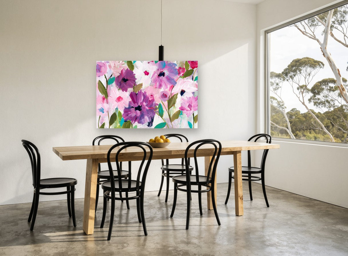 Orchid Haze Bloom floral canvas print on the wall of a dining room